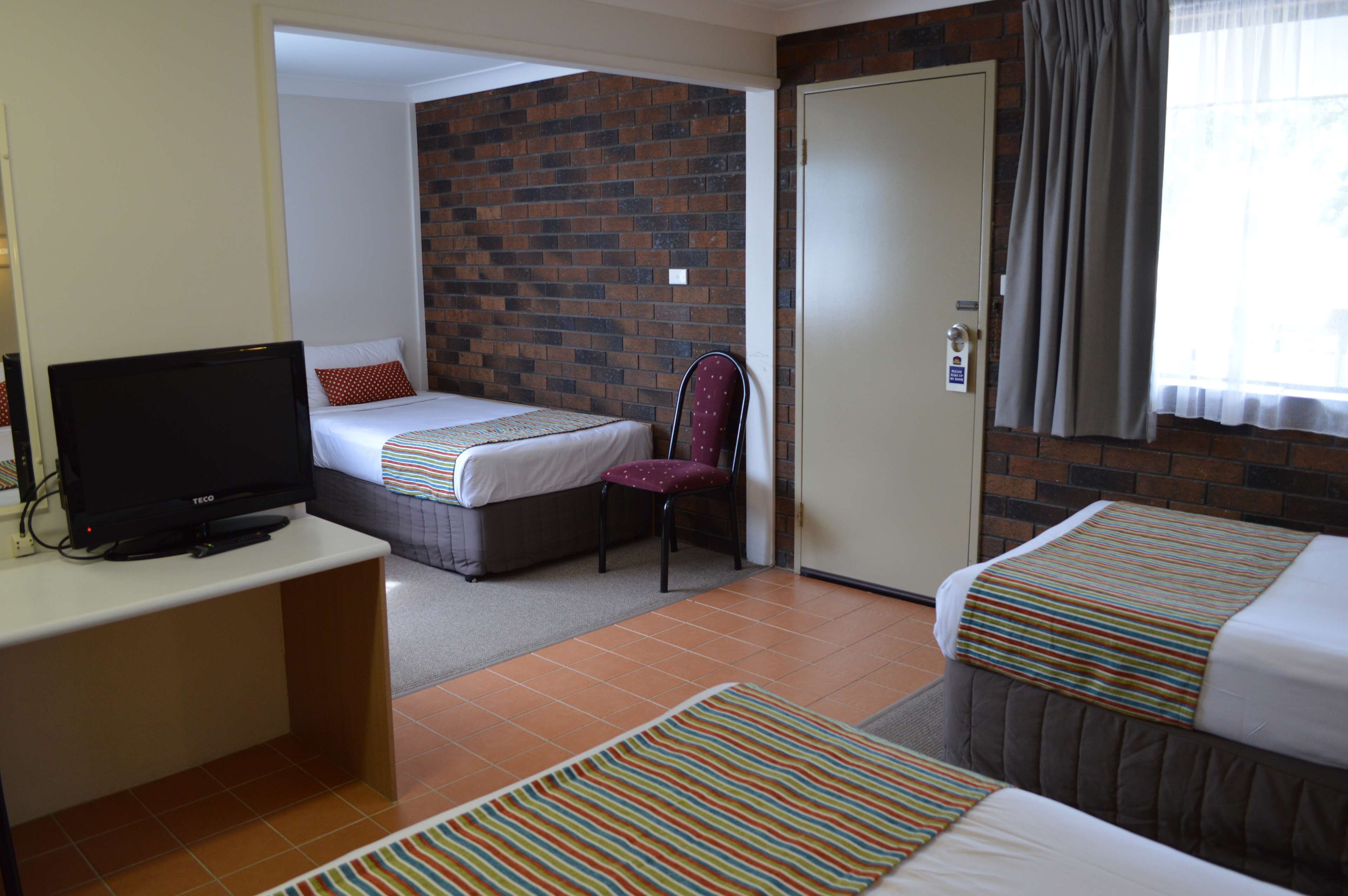 suite, multiple beds, non smoking | pillow-top beds, desk, blackout curtains, iron/ironing board