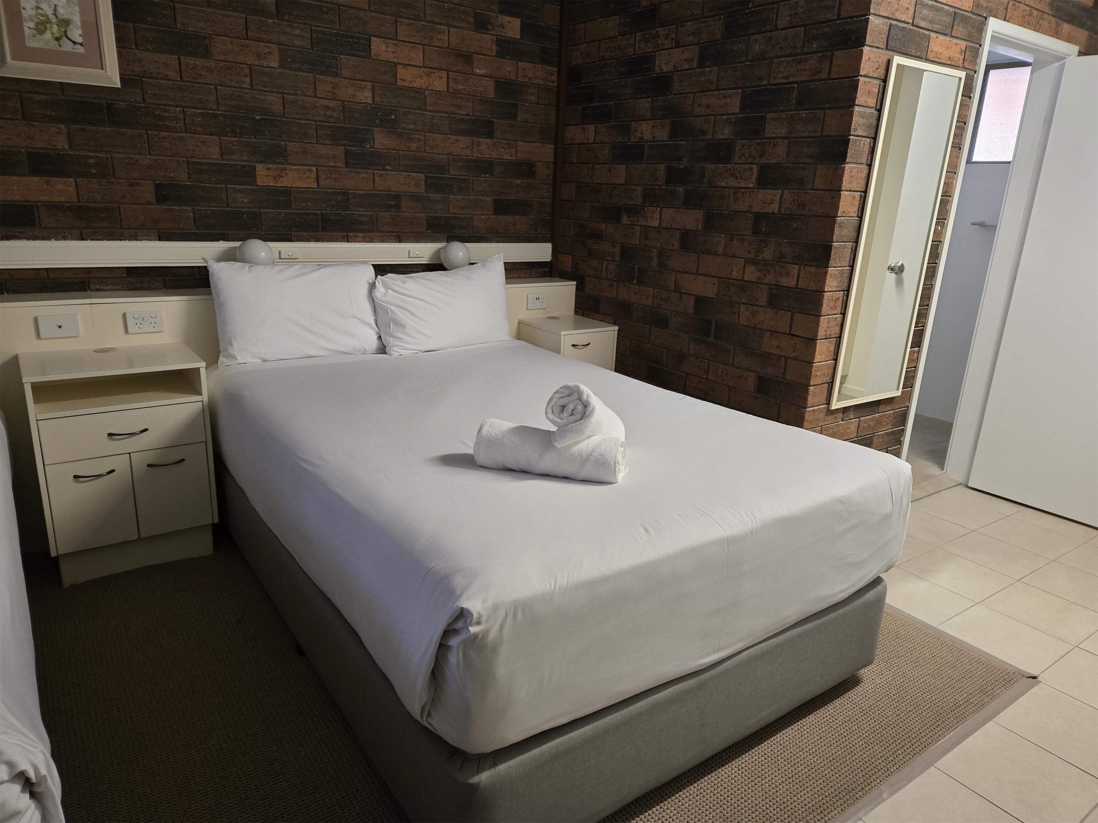 pillow-top beds, desk, blackout curtains, iron/ironing board