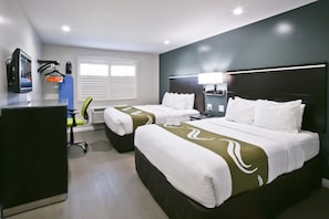 Premium bedding, memory-foam beds, desk, iron/ironing board