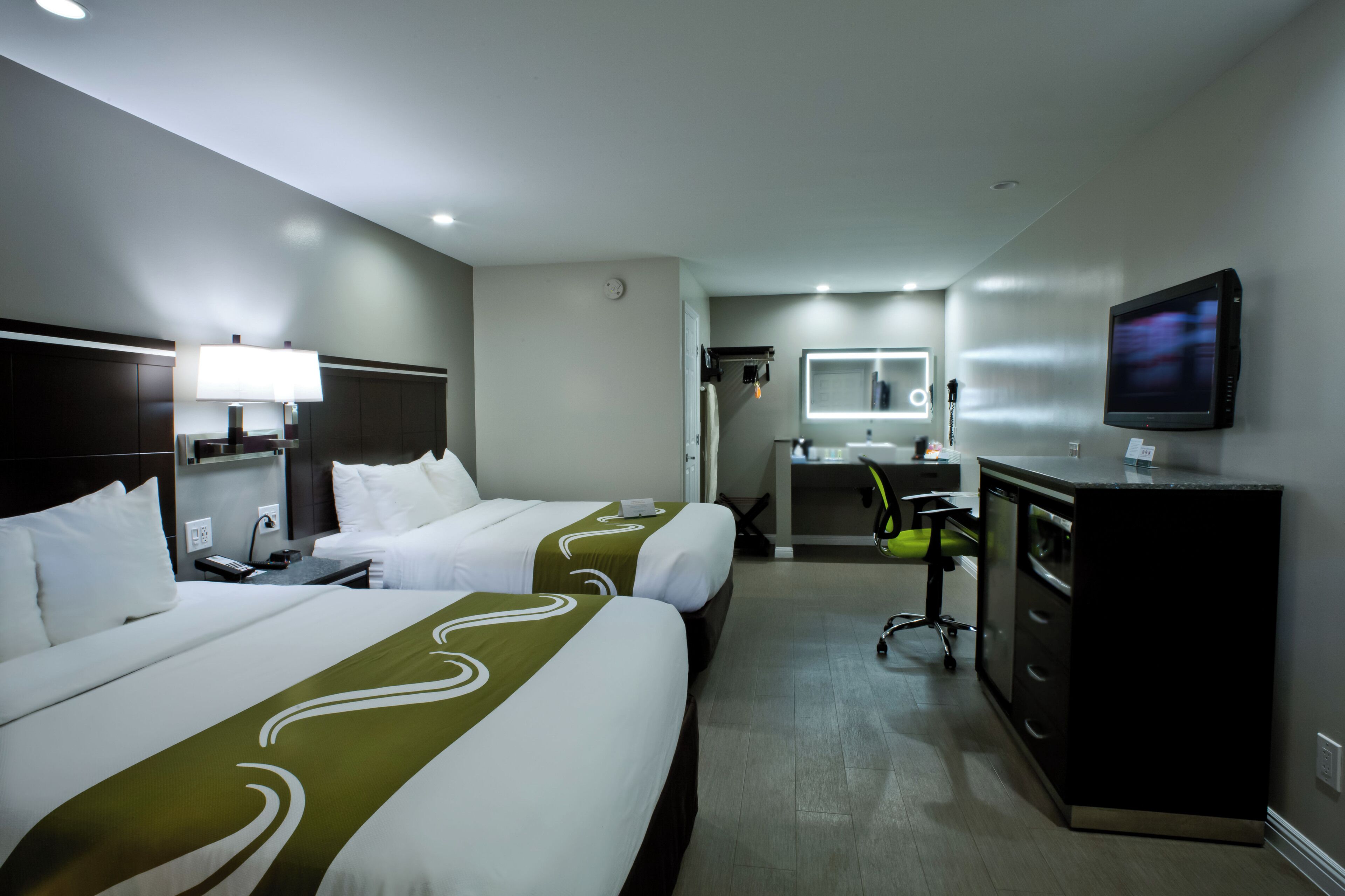 Premium bedding, memory-foam beds, desk, iron/ironing board