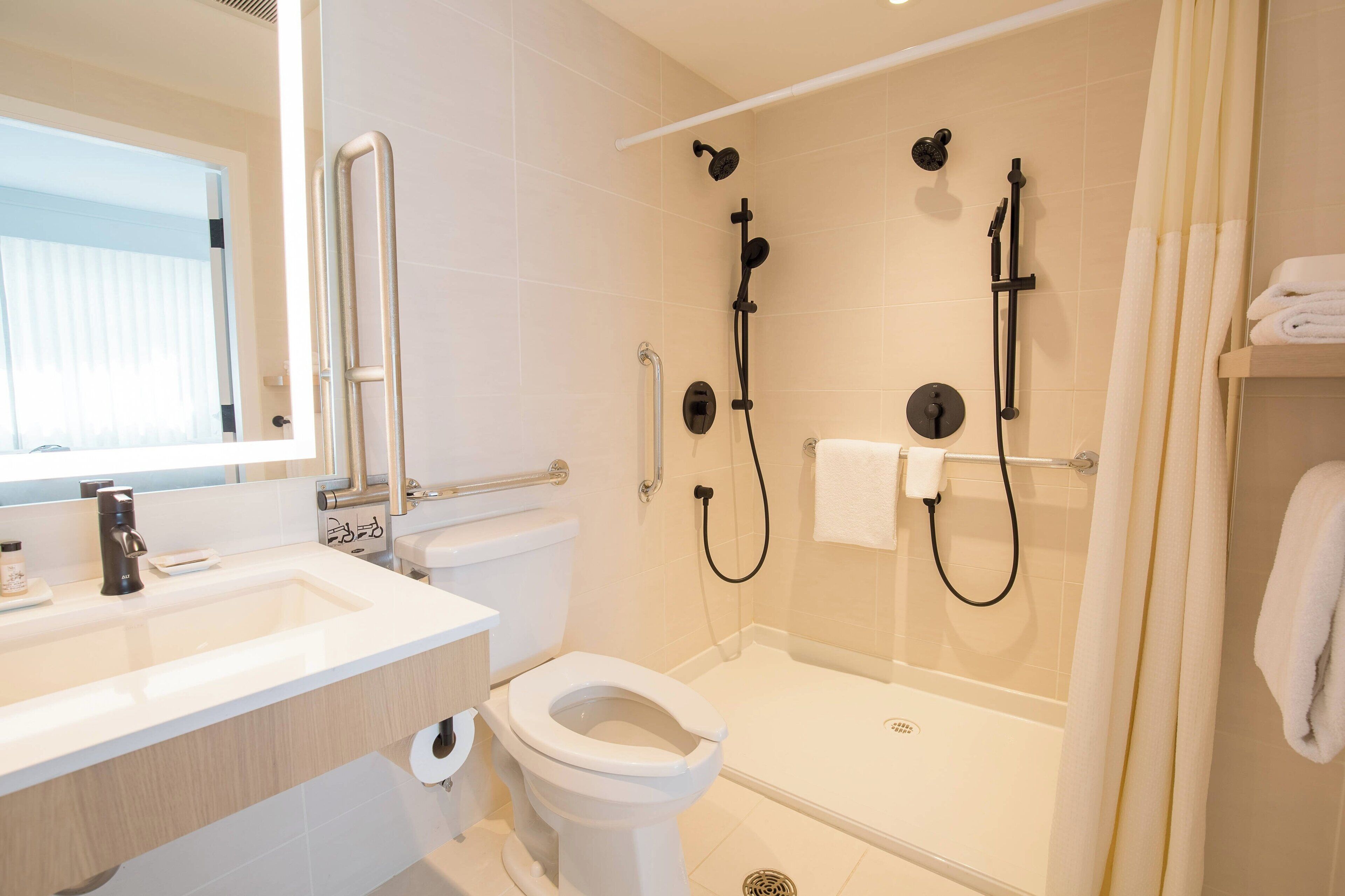 room, 1 king bed | bathroom | shower, rainfall showerhead, free toiletries, hair dryer