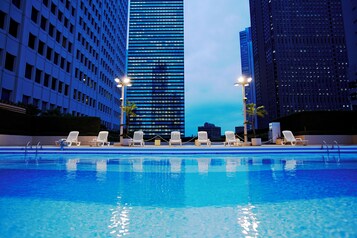 Seasonal outdoor pool, open 9:00 AM to 7:30 PM, lifeguards on site