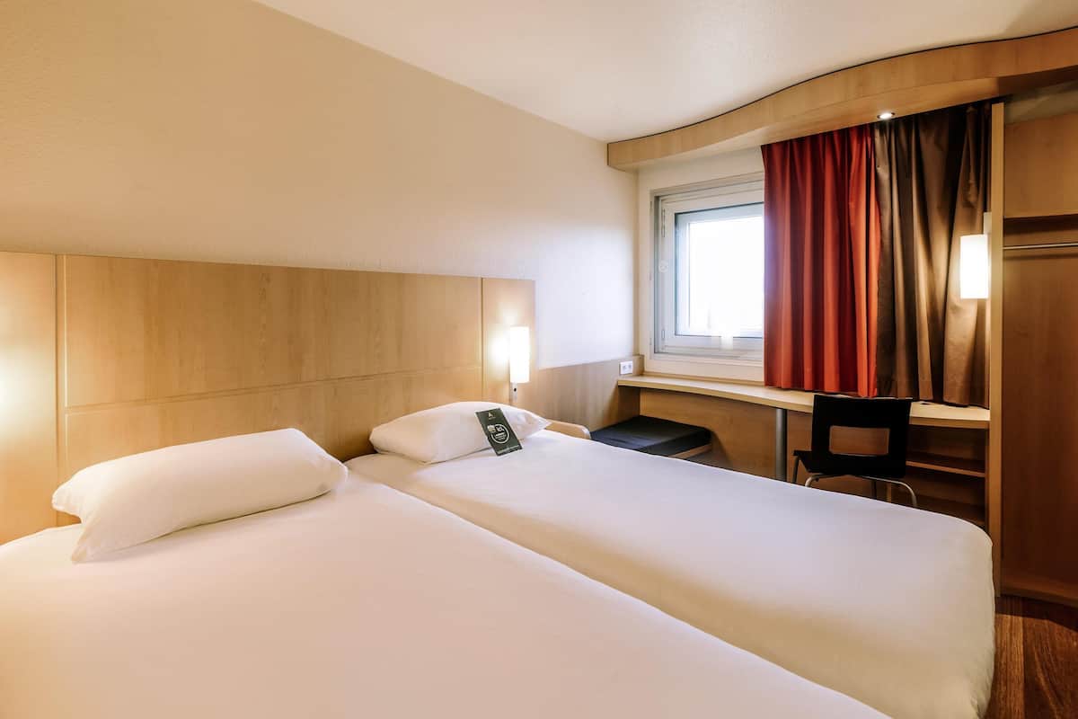 Premium bedding, pillow-top beds, desk, soundproofing