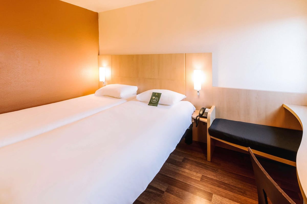 Premium bedding, pillow-top beds, desk, soundproofing
