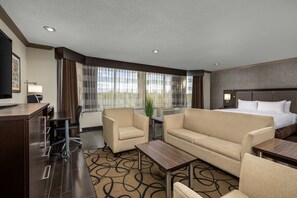 Studio Suite, 1 King Bed (Sweet) | Living area | 49-inch flat-screen TV with cable channels, TV, pay movies