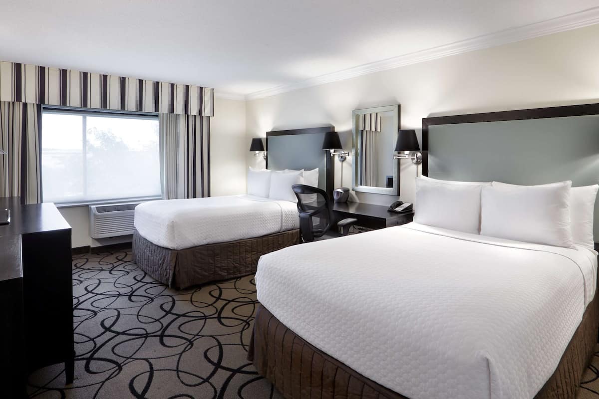 room, 2 double beds (chill) | premium bedding, pillow-top beds, in-room safe, desk