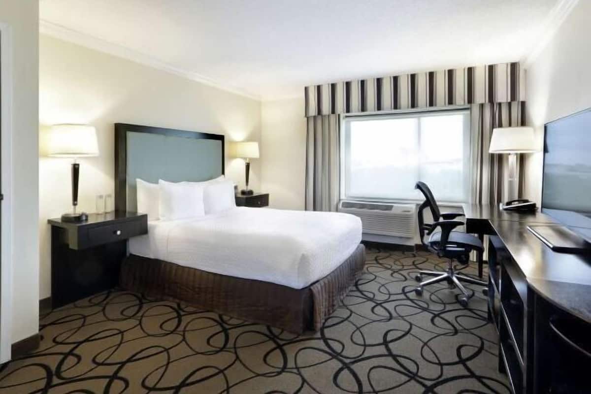 Premium bedding, pillow-top beds, in-room safe, desk