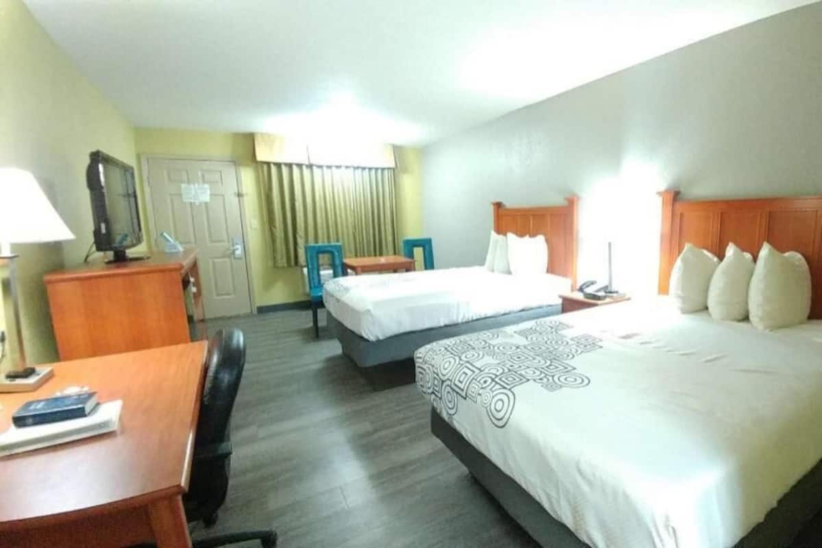 Pillowtop beds, desk, laptop workspace, iron/ironing board