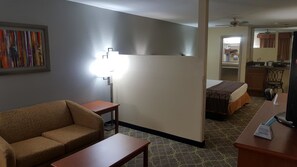 Suite, 1 King Bed, Non Smoking, Refrigerator & Microwave | Pillowtop beds, desk, laptop workspace, iron/ironing board