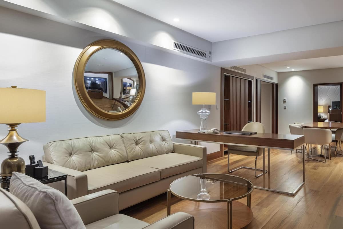 Deluxe Suite, 1 King Bed, Kitchen | Living area | 46-inch LED TV with satellite channels, TV, DVD player