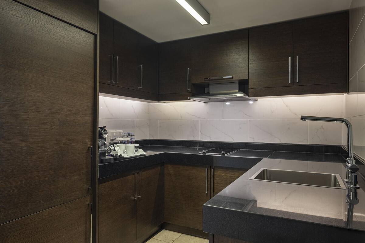 suite, 1 king bed (ambassador) | private kitchen | coffee/tea maker