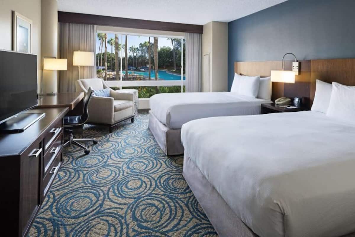Premium bedding, pillow-top beds, in-room safe, desk