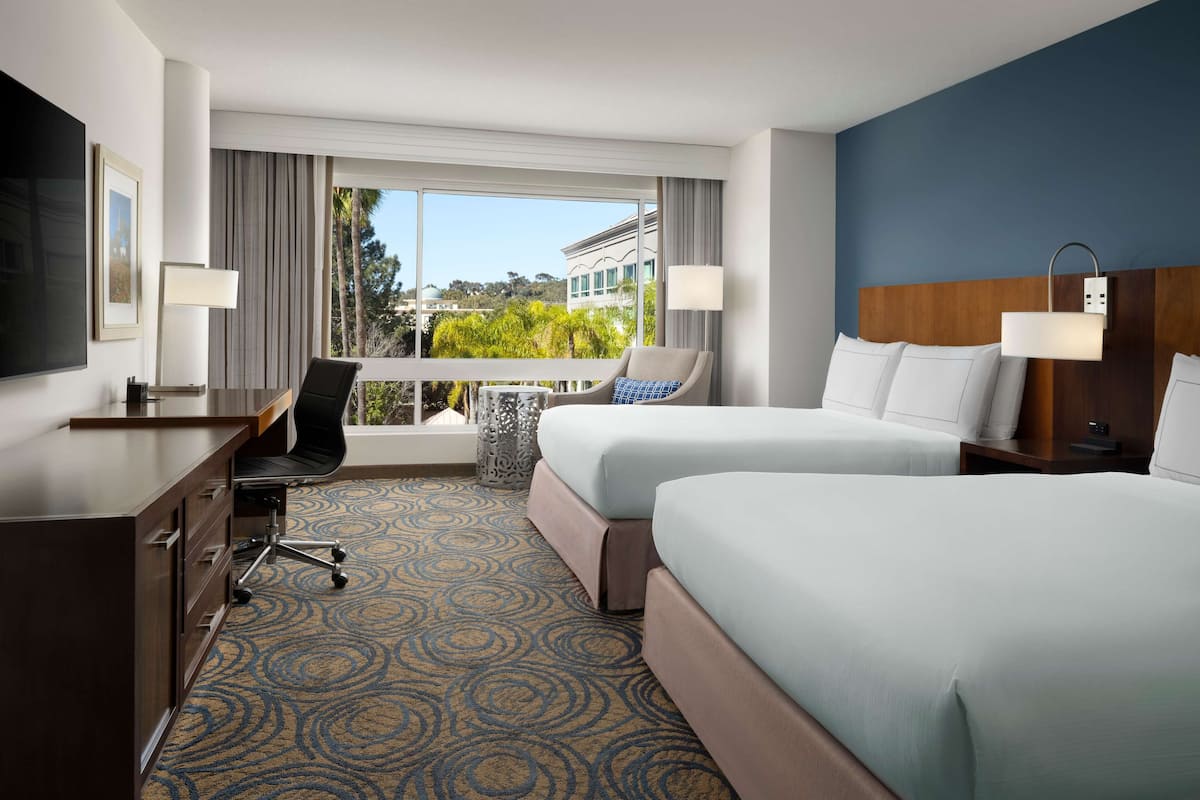 Premium bedding, pillow-top beds, in-room safe, desk