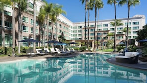 Outdoor pool, open 7:00 AM to 10 PM, cabanas (surcharge), pool umbrellas
