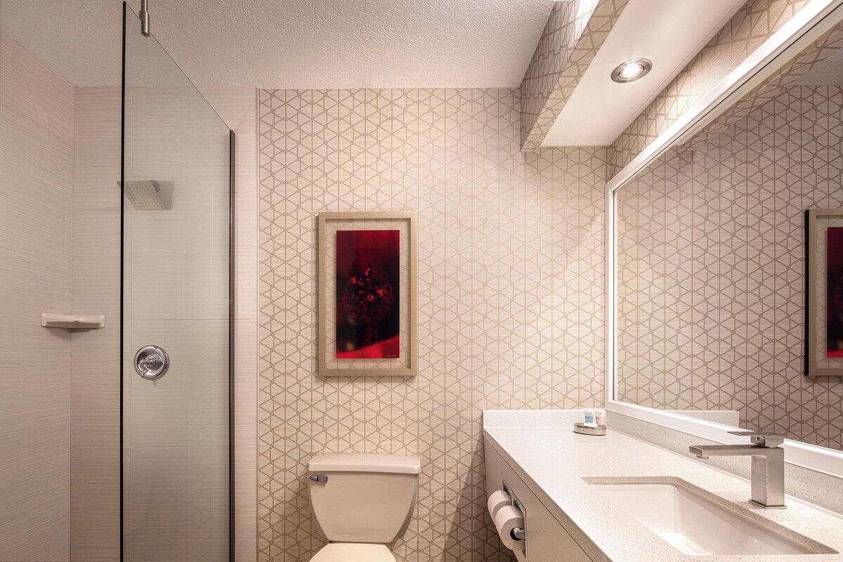 Shower, eco-friendly toiletries, hair dryer, towels