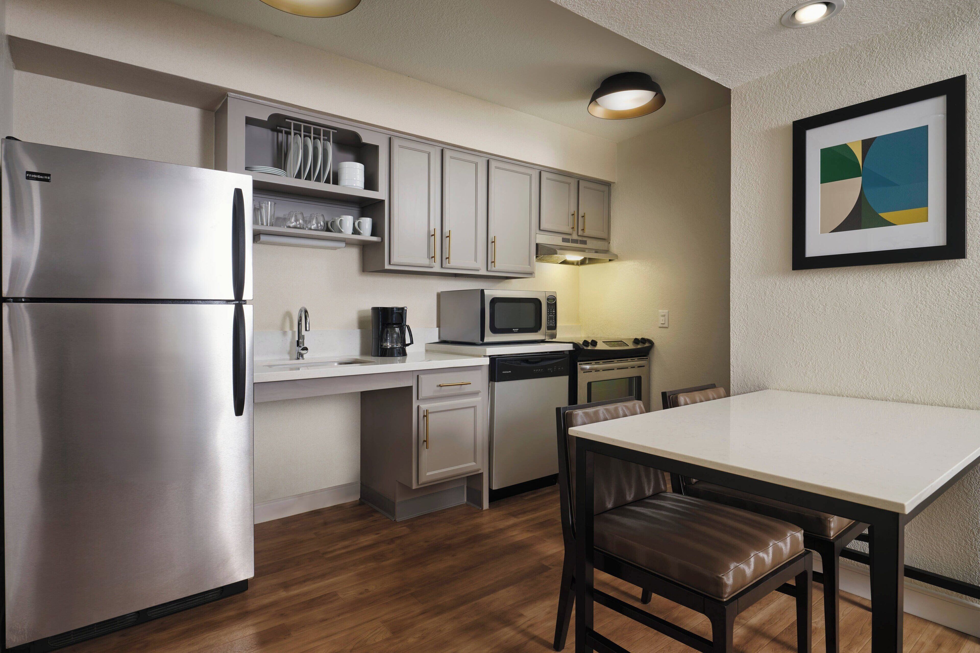 premium studio, 1 queen bed with sofa bed, non smoking | private kitchen | full-sized fridge, microwave, oven, stovetop