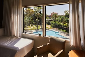 Comfort Double Room, Pool View | Down duvets, minibar, in-room safe, desk