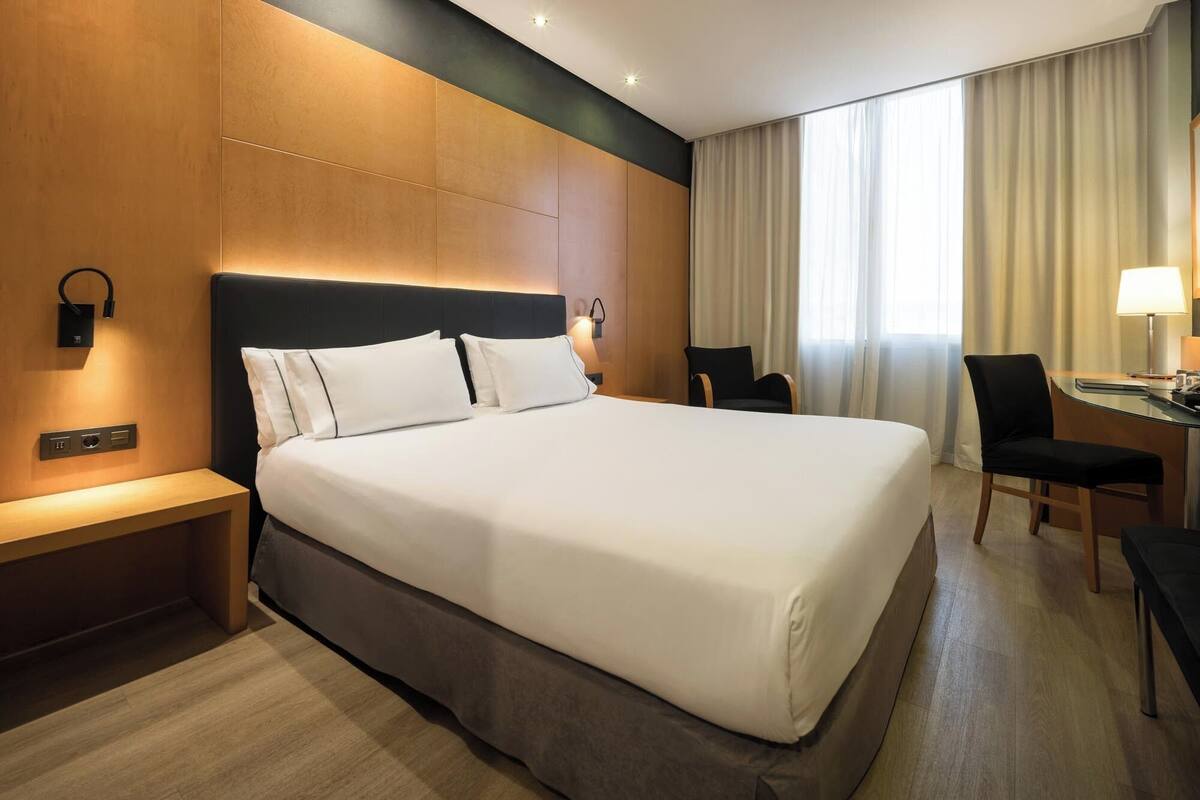 Ropa de cama de alta calidad, edredón y minibar 