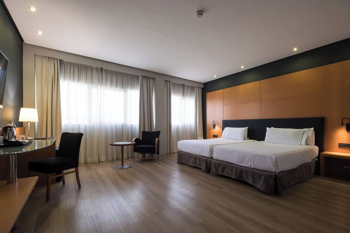 Ropa de cama de alta calidad, edredón y minibar 
