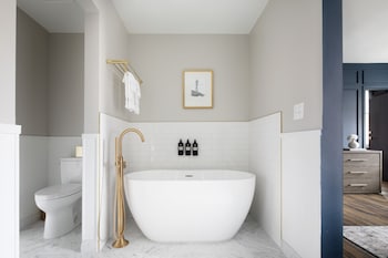 Grand Suite (Beacon) | Bathroom | Rainfall showerhead, designer toiletries, hair dryer, towels at Beacon Grand, A Union Square Hotel 