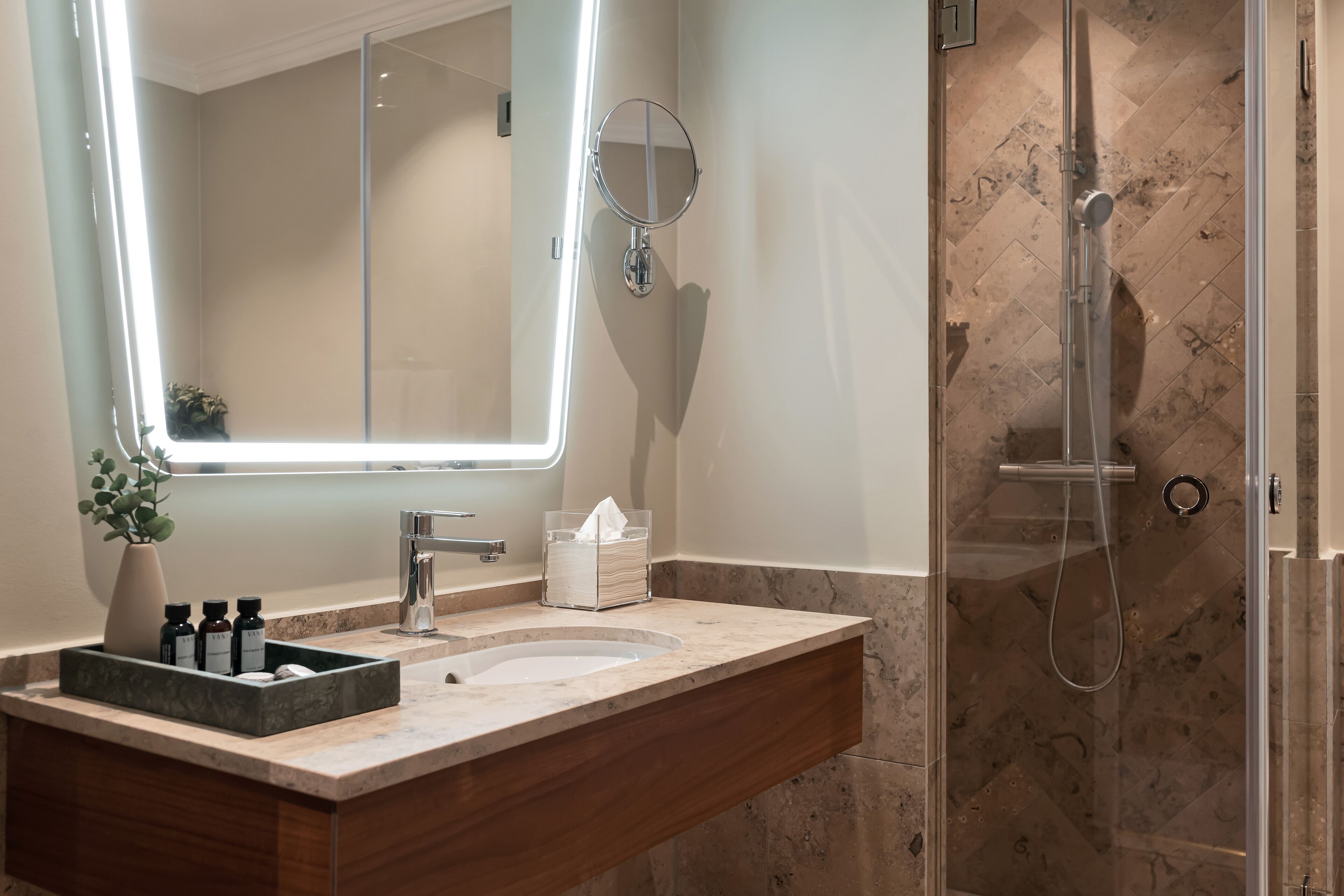 deluxe room | bathroom | designer toiletries, hair dryer, towels