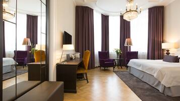 Suíte júnior | 1 quarto, cofres nos quartos, individualmente decorados