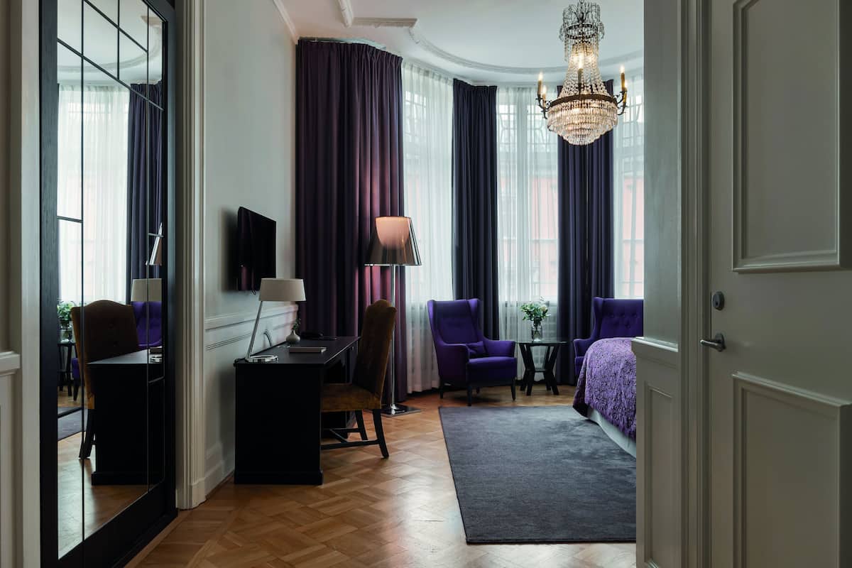 junior suite | 1 bedroom, in-room safe, individually decorated, individually furnished