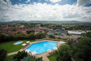 Outdoor pool, pool umbrellas, pool loungers