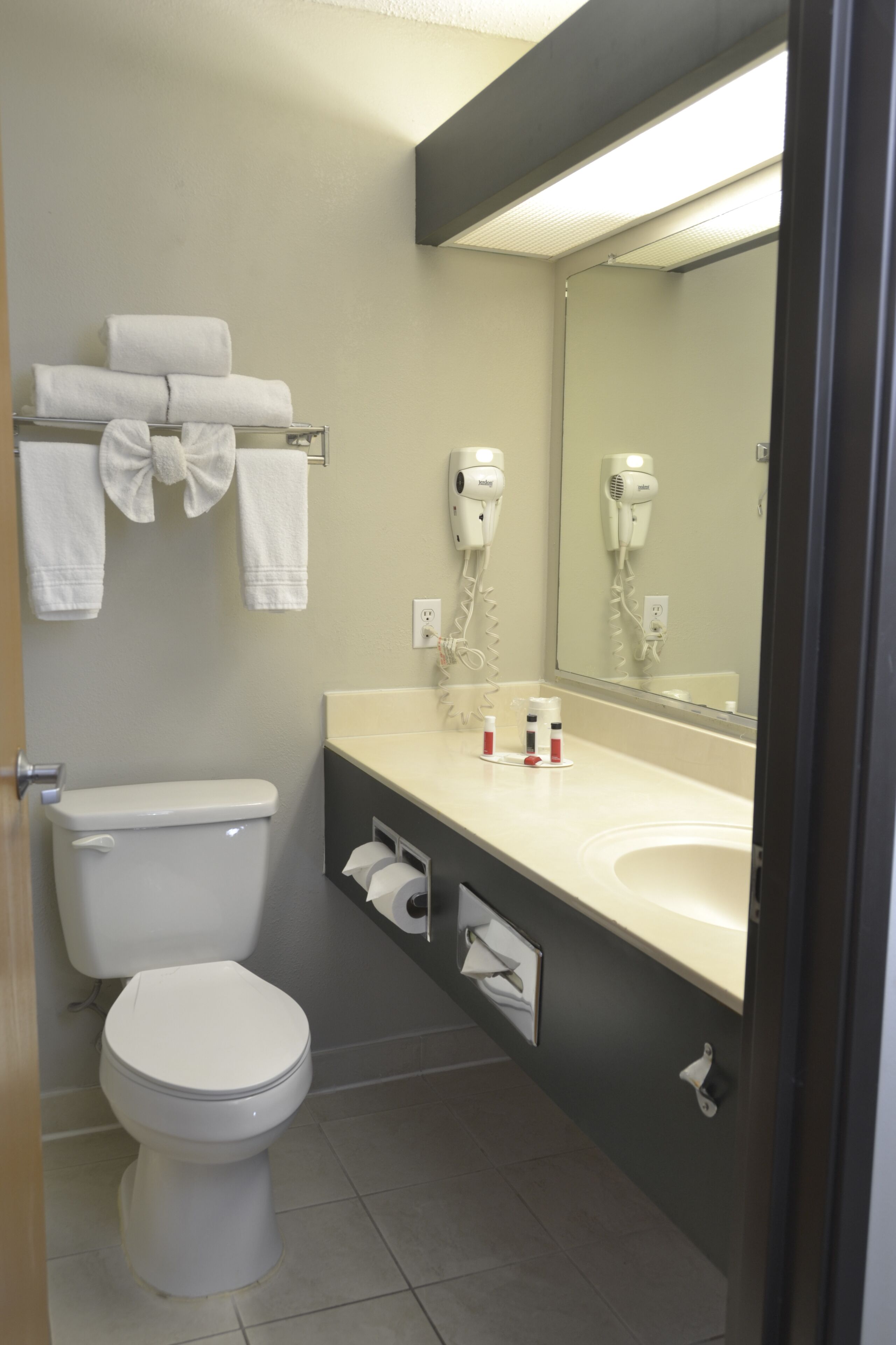 desk, laptop workspace, blackout curtains, iron/ironing board