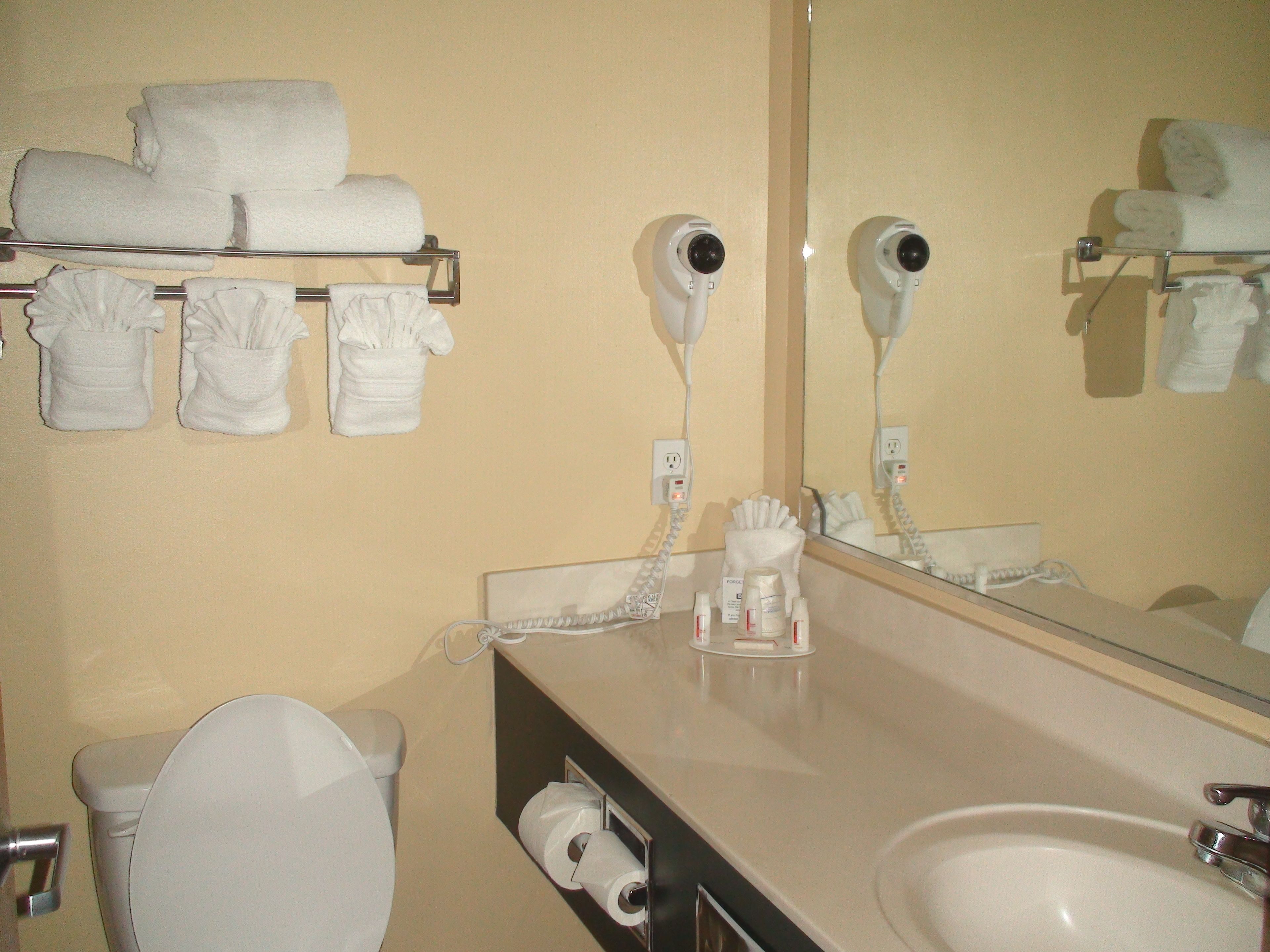 desk, laptop workspace, blackout curtains, iron/ironing board