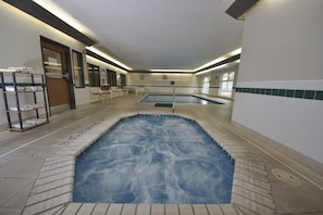 Indoor pool, open 9:00 AM to 11:00 PM, pool loungers