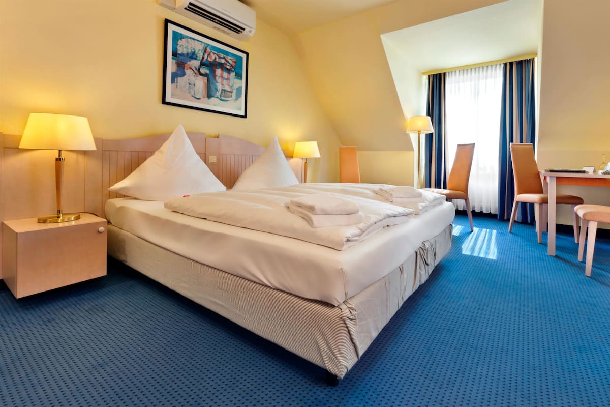 In-room safe, desk, blackout curtains, soundproofing