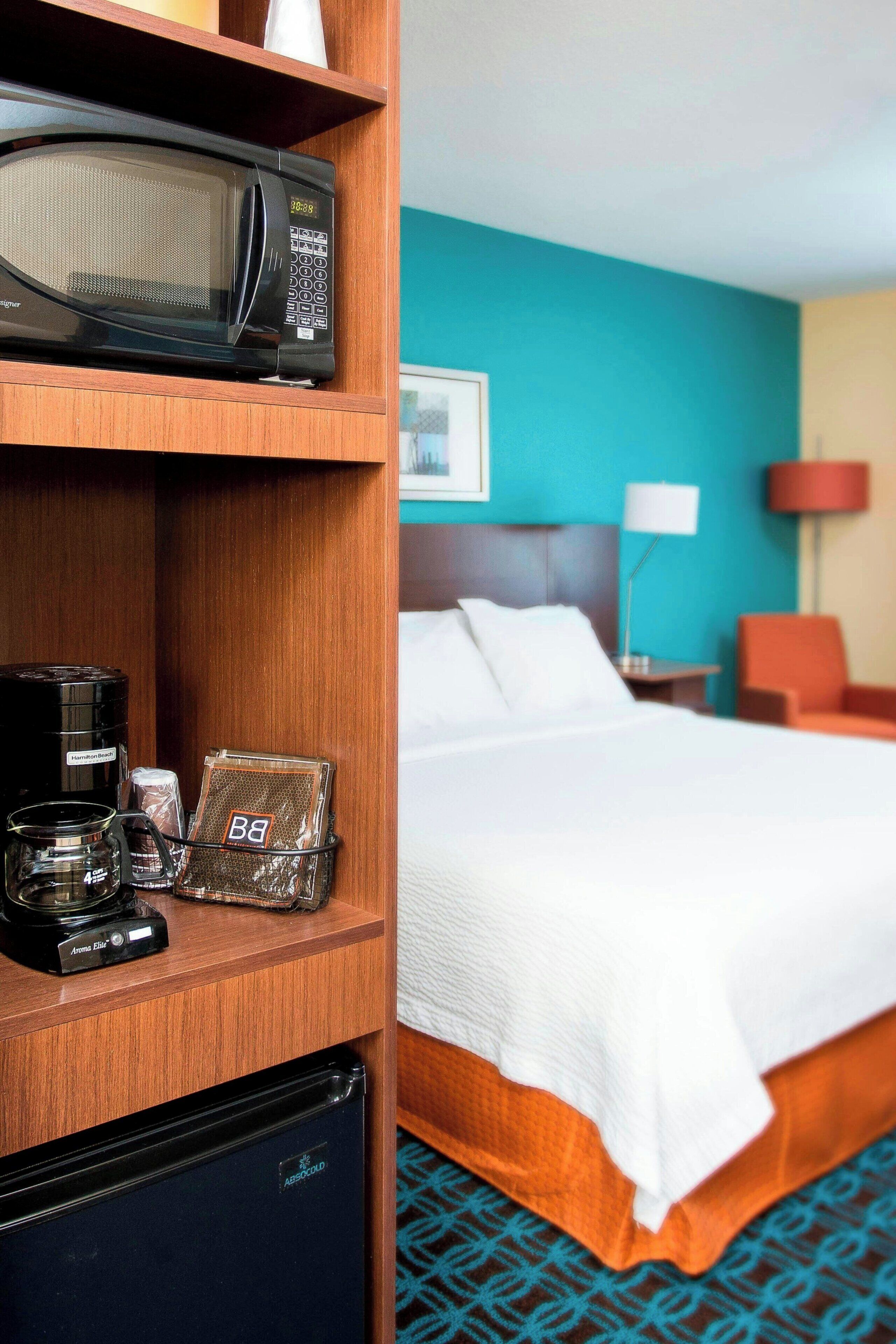 premium bedding, desk, blackout curtains, iron/ironing board