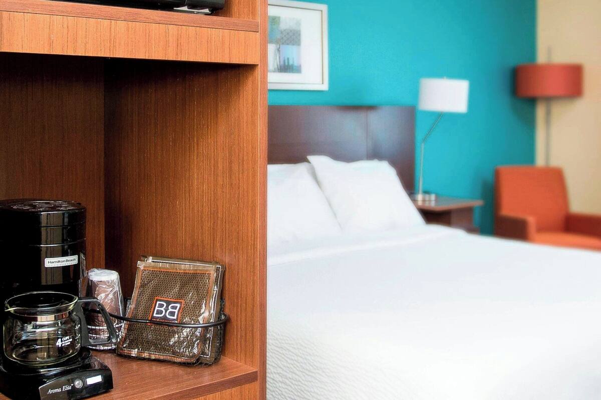 Premium bedding, desk, blackout curtains, iron/ironing board