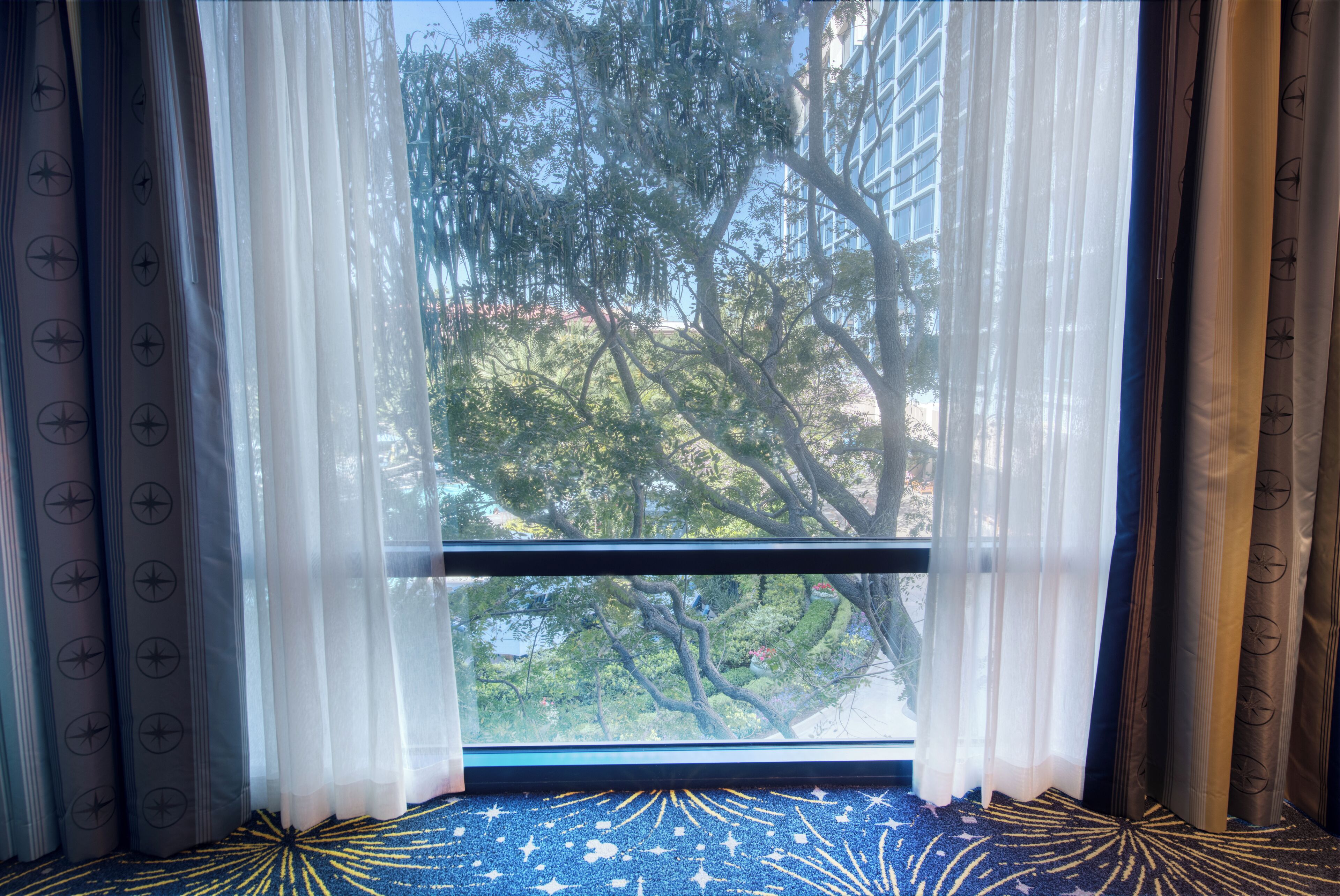 deluxe room (lower level) | premium bedding, in-room safe, individually decorated