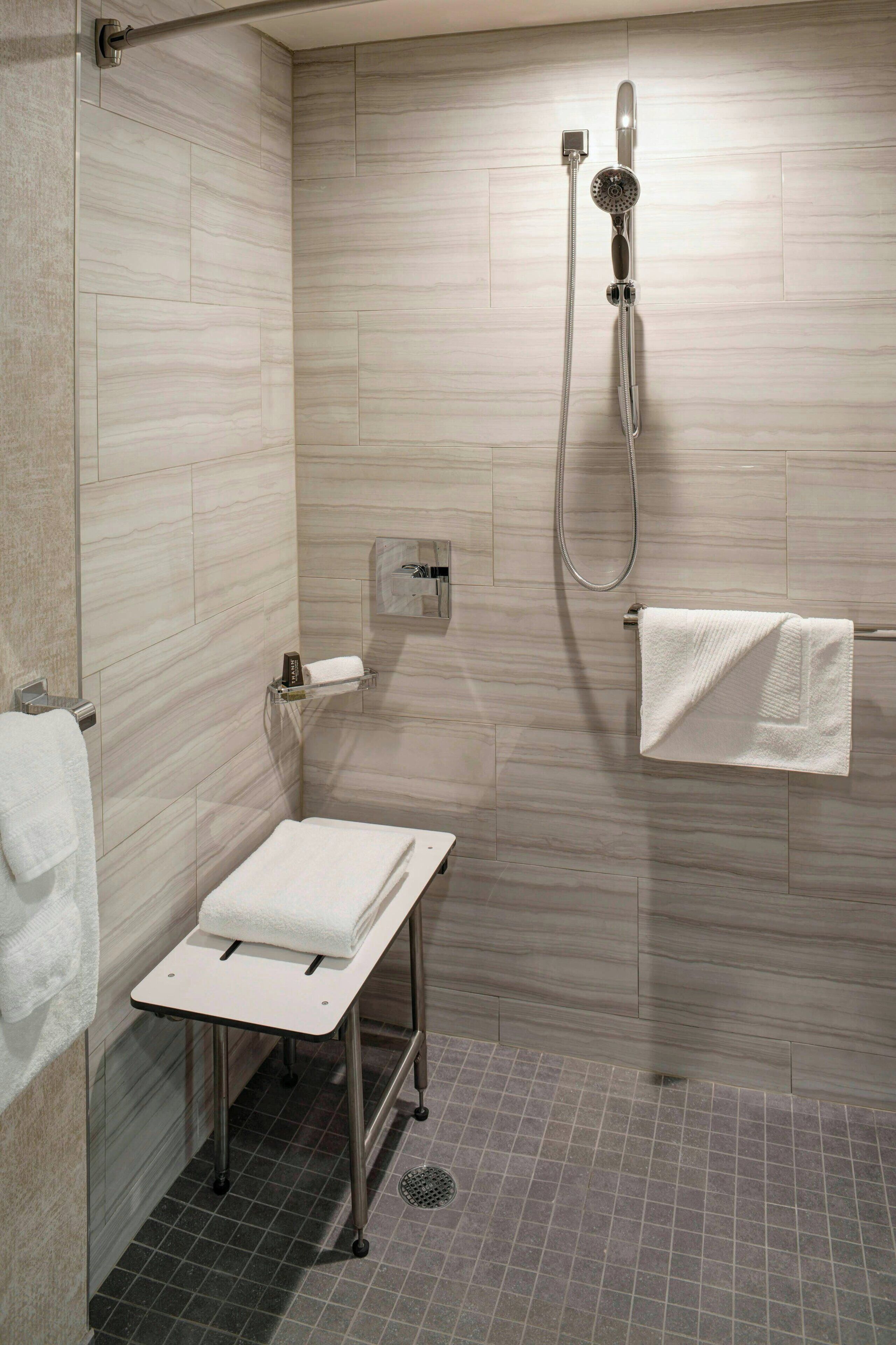 combined shower/bathtub, free toiletries, hair dryer, towels