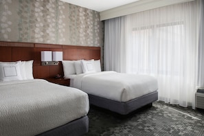 Premium bedding, pillowtop beds, desk, laptop workspace