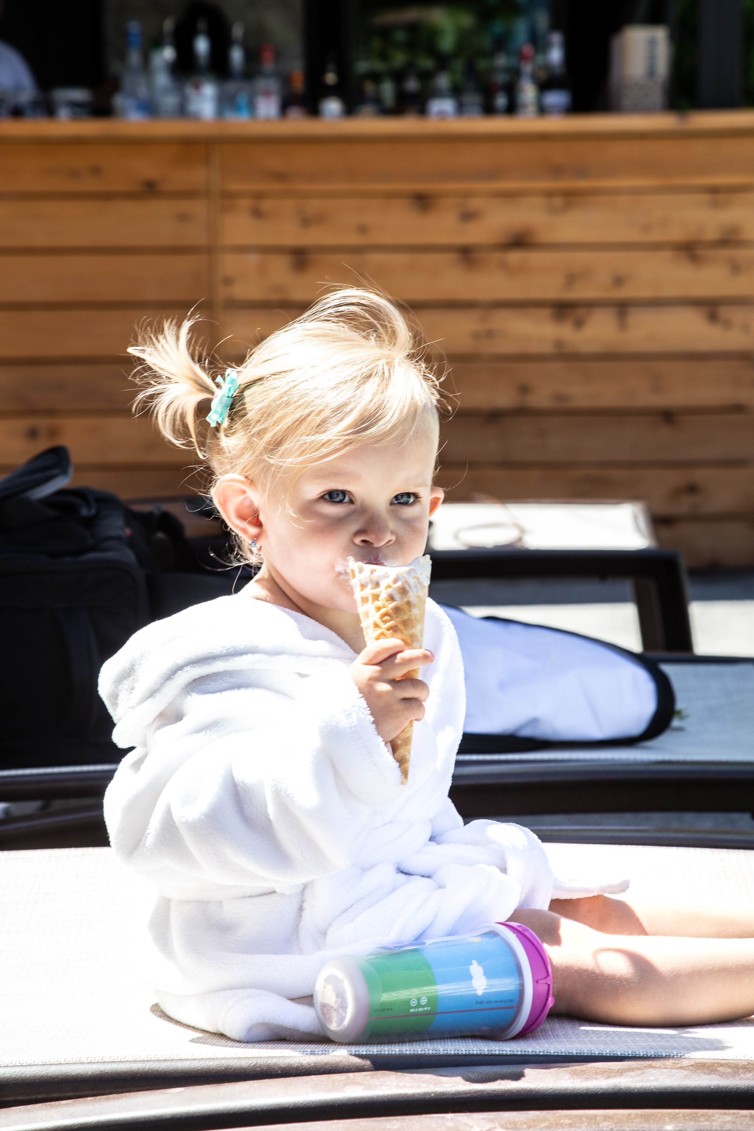 outdoor pool, a heated pool, pool umbrellas, pool loungers