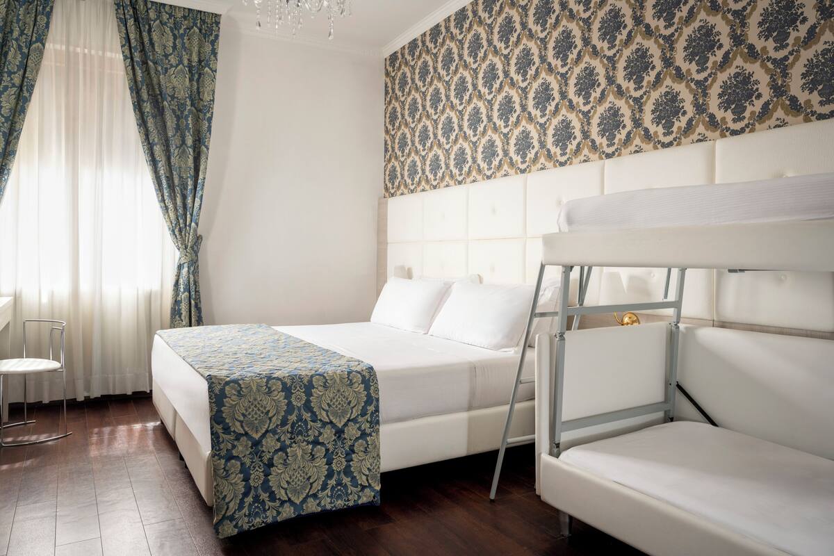 Classic Quadruple Room | Down comforters, minibar, in-room safe, desk