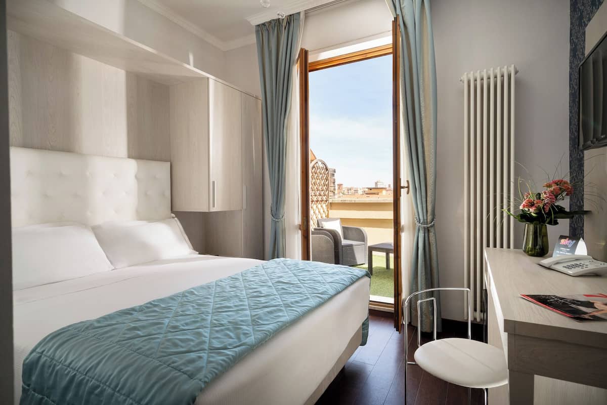Room, Terrace, City View | Down comforters, minibar, in-room safe, desk