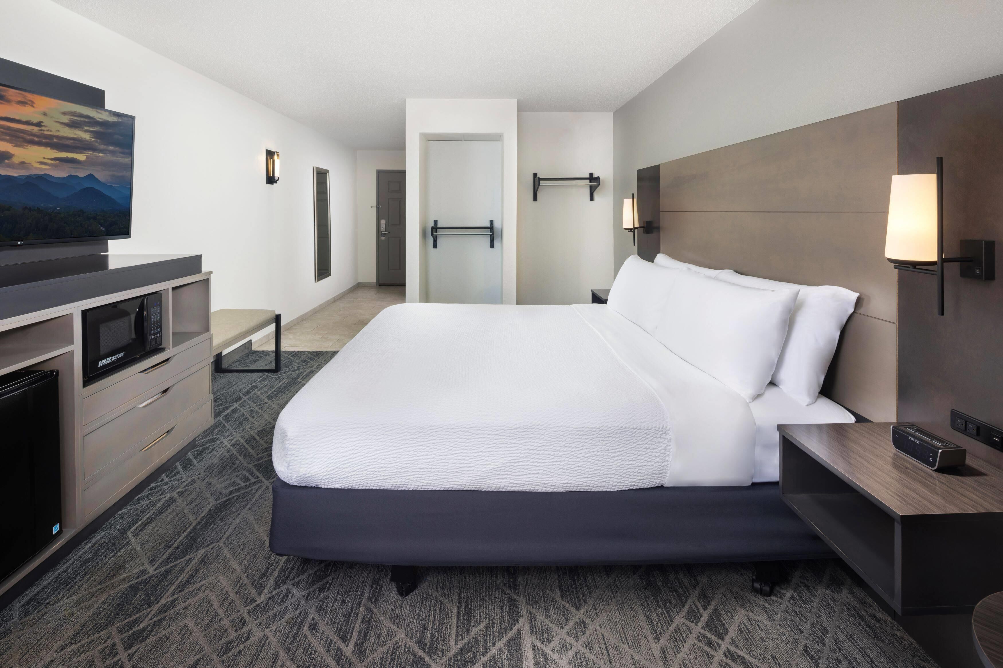 Premium bedding, desk, blackout curtains, iron/ironing board