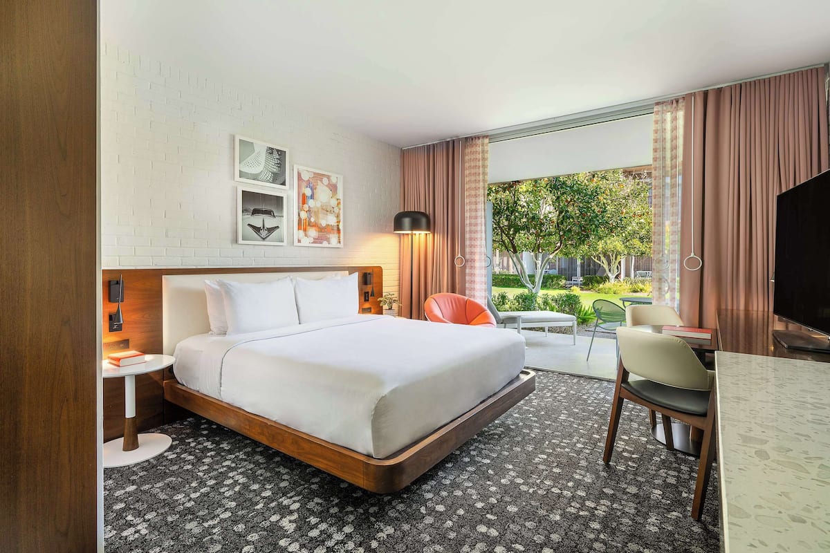 Chambre Signature, 1 très grand lit, accessible aux personnes à mobilité réduite