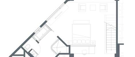 A floor plan of a building with multiple rooms, including a kitchen, dining area, and living spaces.
