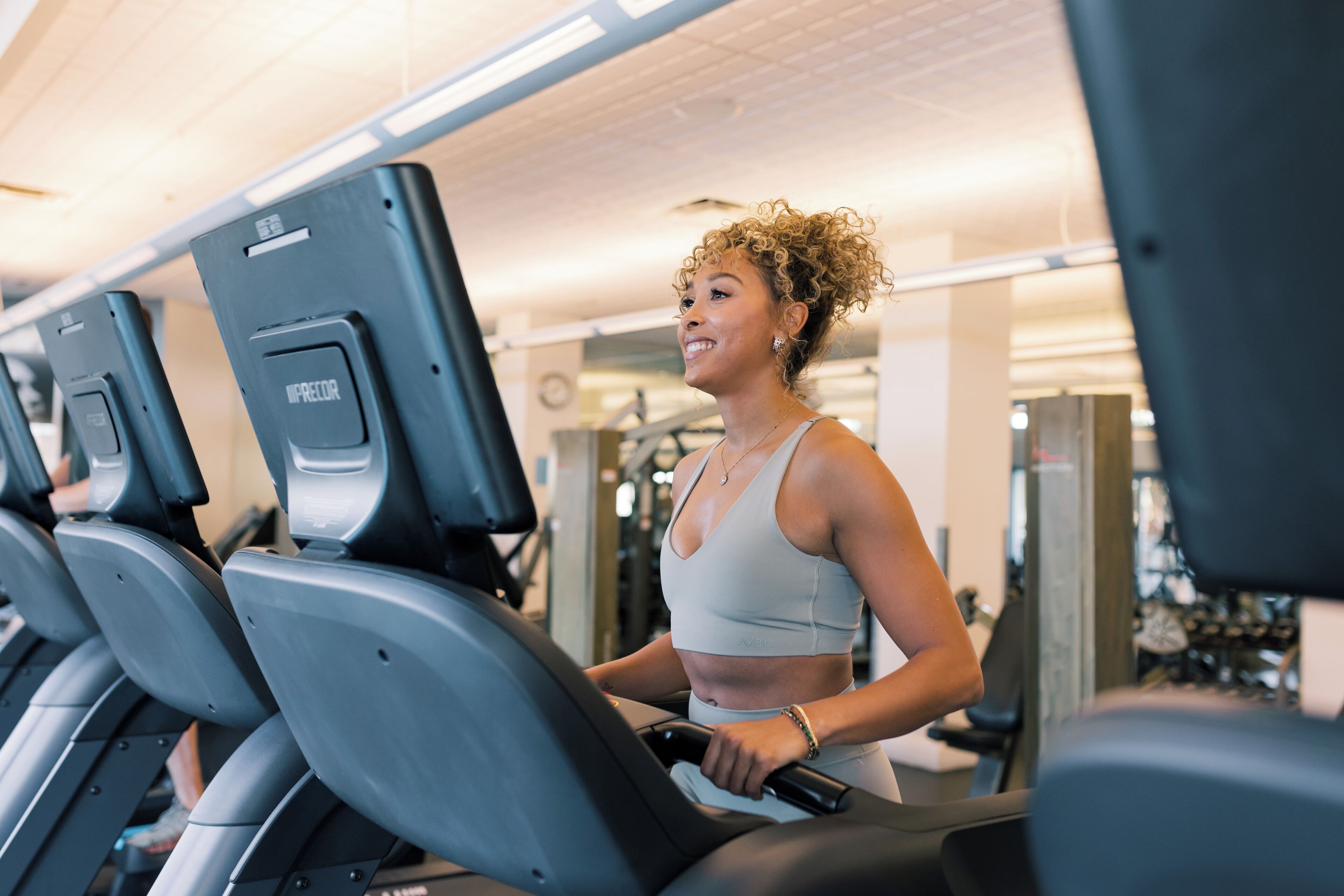 A gym with treadmills and exercise equipment.