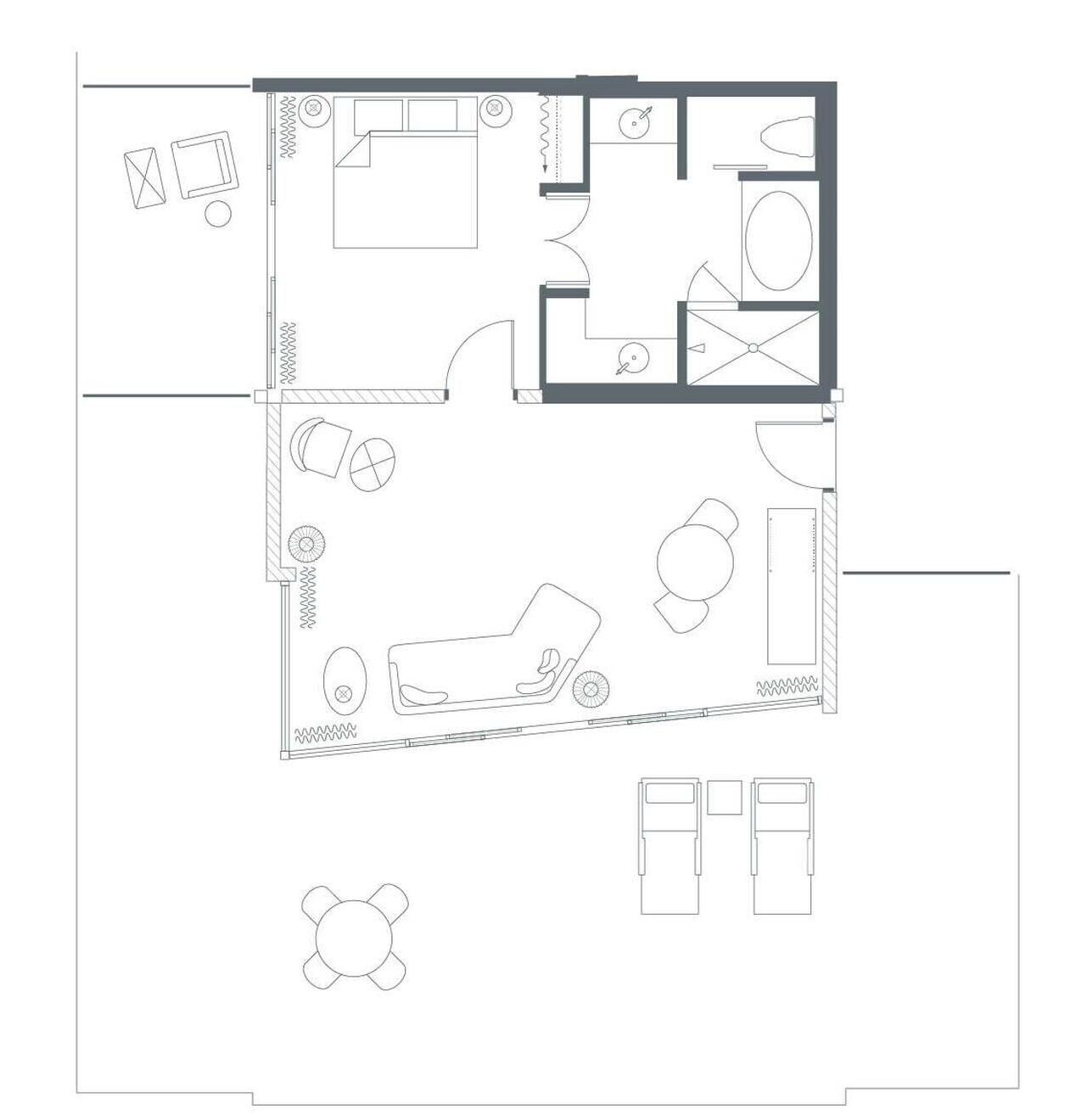 Un plan d’étage comprenant un espace de vie, une cuisine, une salle de bain et deux chambres.