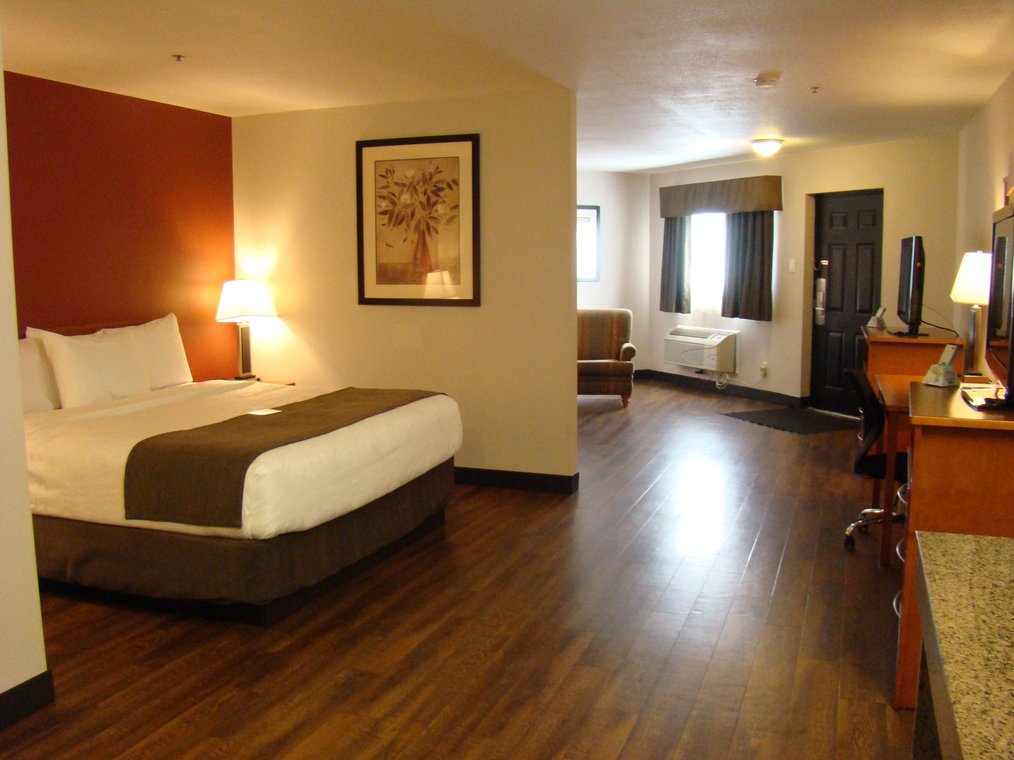 desk, laptop workspace, blackout curtains, iron/ironing board