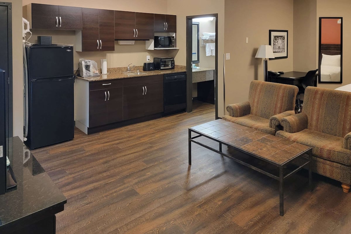 desk, laptop workspace, blackout curtains, iron/ironing board