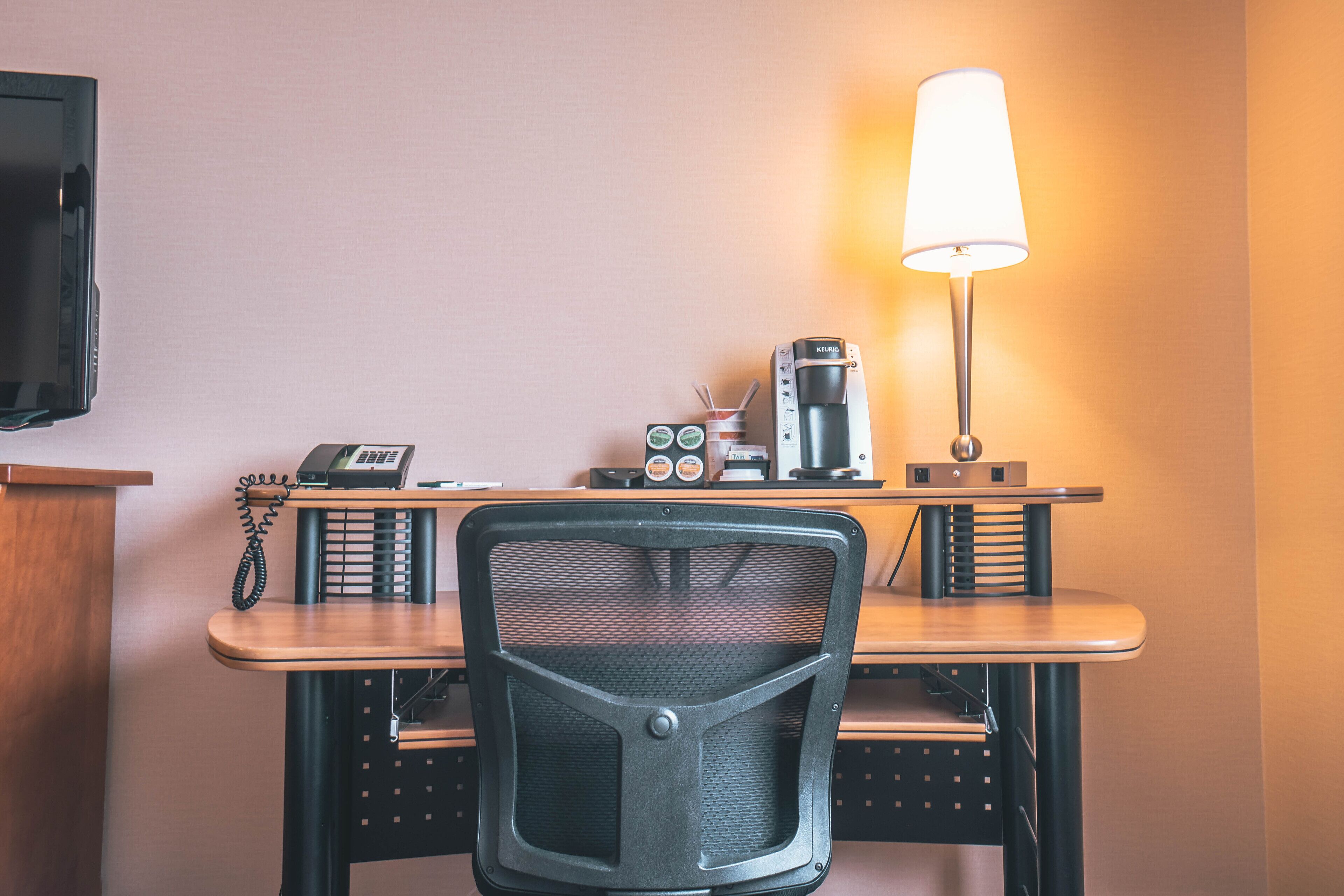desk, laptop workspace, blackout curtains, iron/ironing board