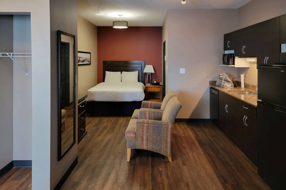 desk, laptop workspace, blackout curtains, iron/ironing board