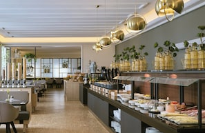 Breakfast, lunch, dinner served; Mediterranean cuisine, garden views